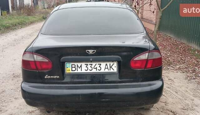 Чорний Деу Ланос, об'ємом двигуна 1.4 л та пробігом 180 тис. км за 1600 $, фото 1 на Automoto.ua