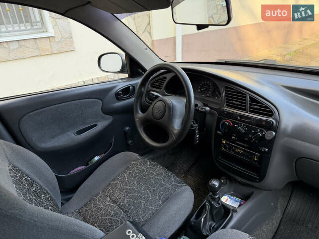 Черный Дэу Ланос, объемом двигателя 1.5 л и пробегом 100 тыс. км за 2900 $, фото 31 на Automoto.ua