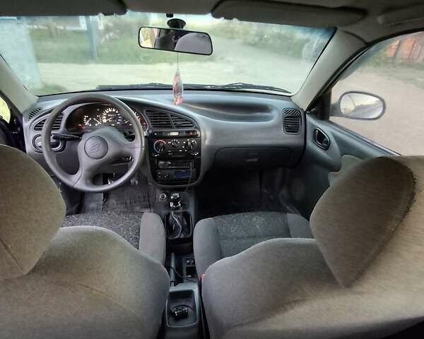 Черный Дэу Ланос, объемом двигателя 1.5 л и пробегом 540 тыс. км за 2250 $, фото 8 на Automoto.ua