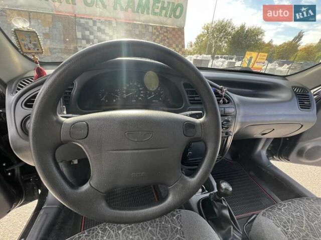 Чорний Деу Ланос, об'ємом двигуна 1.6 л та пробігом 137 тис. км за 3900 $, фото 12 на Automoto.ua