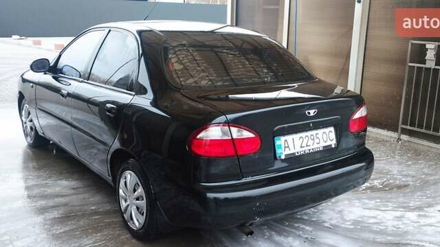 Черный Дэу Ланос, объемом двигателя 1.6 л и пробегом 154 тыс. км за 2800 $, фото 2 на Automoto.ua