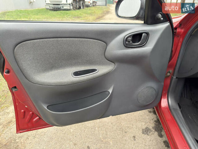 Черный Дэу Ланос, объемом двигателя 1.6 л и пробегом 156 тыс. км за 2400 $, фото 27 на Automoto.ua