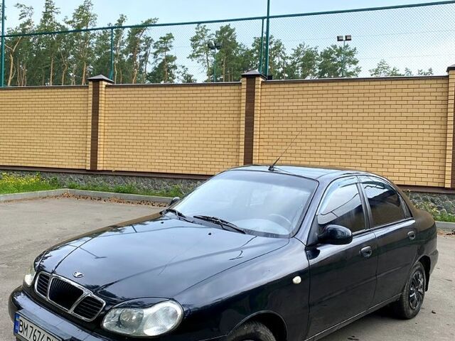Черный Дэу Ланос, объемом двигателя 1.4 л и пробегом 245 тыс. км за 1700 $, фото 3 на Automoto.ua