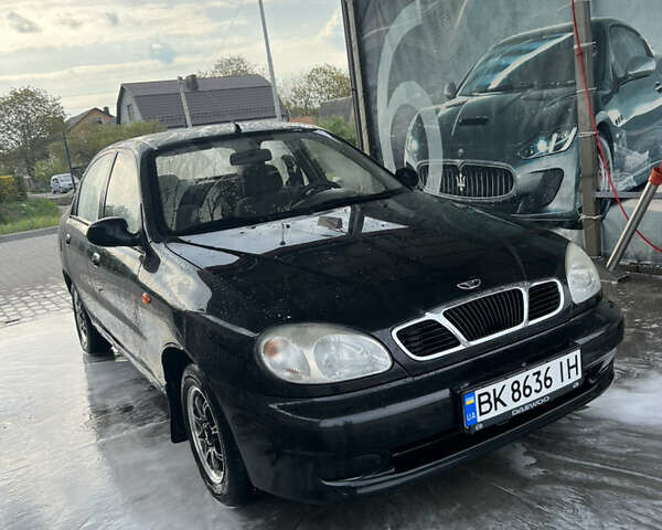 Черный Дэу Ланос, объемом двигателя 1.5 л и пробегом 162 тыс. км за 2200 $, фото 2 на Automoto.ua