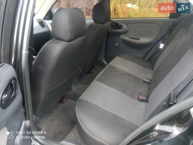 Чорний Деу Ланос, об'ємом двигуна 1.6 л та пробігом 230 тис. км за 1750 $, фото 2 на Automoto.ua