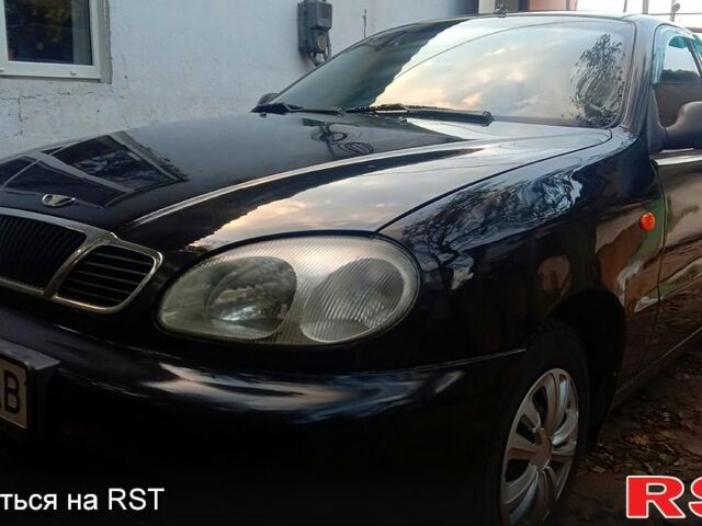 Черный Дэу Ланос, объемом двигателя 1.5 л и пробегом 276 тыс. км за 2000 $, фото 1 на Automoto.ua