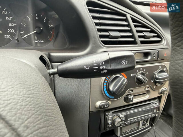 Черный Дэу Ланос, объемом двигателя 1.6 л и пробегом 156 тыс. км за 2400 $, фото 19 на Automoto.ua