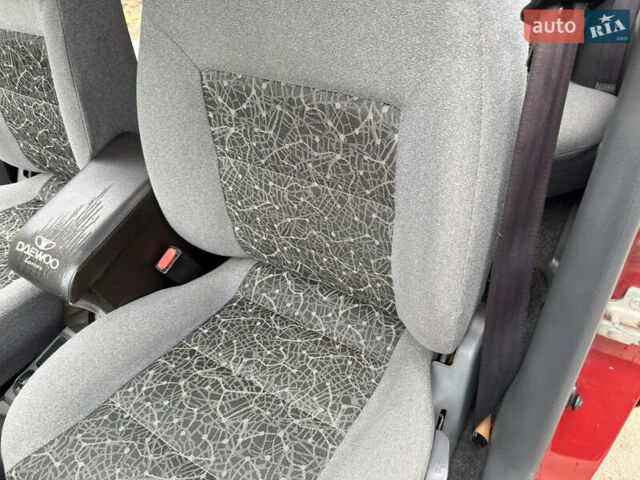 Черный Дэу Ланос, объемом двигателя 1.6 л и пробегом 156 тыс. км за 2400 $, фото 25 на Automoto.ua