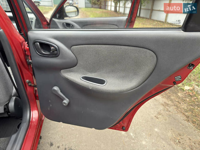 Черный Дэу Ланос, объемом двигателя 1.6 л и пробегом 156 тыс. км за 2400 $, фото 12 на Automoto.ua