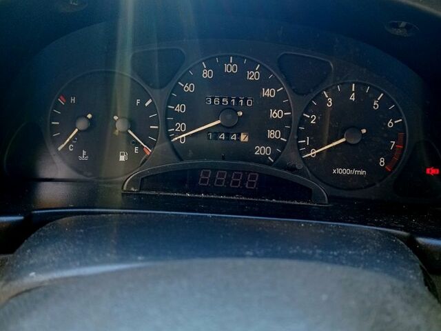 Черный Дэу Ланос, объемом двигателя 1.5 л и пробегом 365 тыс. км за 2000 $, фото 6 на Automoto.ua