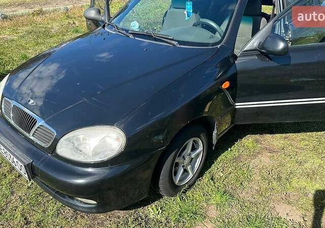 Чорний Деу Ланос, об'ємом двигуна 1.5 л та пробігом 235 тис. км за 2500 $, фото 3 на Automoto.ua