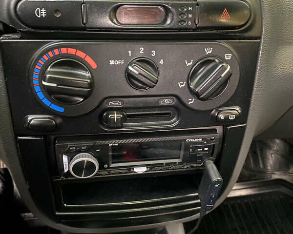 Черный Дэу Ланос, объемом двигателя 1.5 л и пробегом 210 тыс. км за 2700 $, фото 15 на Automoto.ua