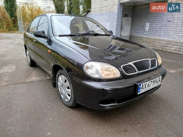 Черный Дэу Ланос, объемом двигателя 1.5 л и пробегом 350 тыс. км за 2000 $, фото 1 на Automoto.ua