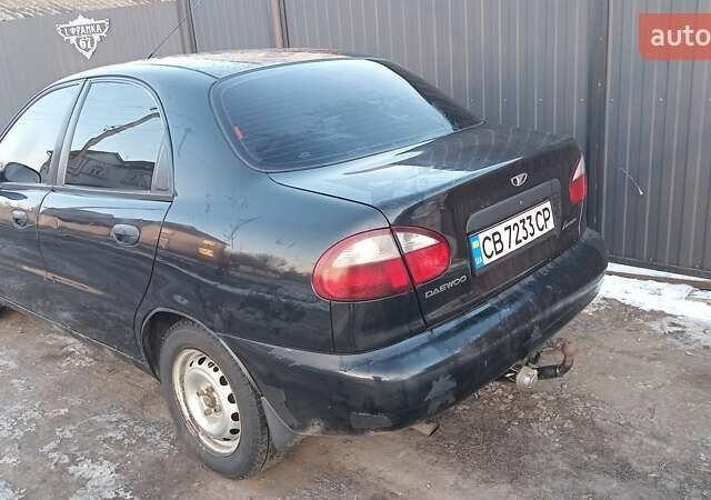 Черный Дэу Ланос, объемом двигателя 1.5 л и пробегом 222 тыс. км за 2350 $, фото 3 на Automoto.ua