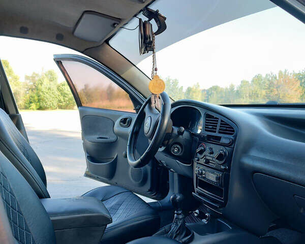 Черный Дэу Ланос, объемом двигателя 1.5 л и пробегом 160 тыс. км за 2500 $, фото 5 на Automoto.ua