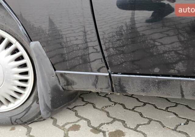 Черный Дэу Ланос, объемом двигателя 1.39 л и пробегом 213 тыс. км за 2300 $, фото 9 на Automoto.ua