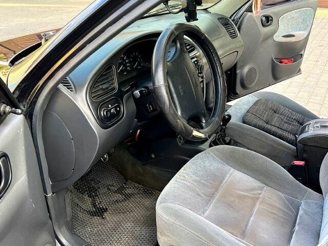 Черный Дэу Ланос, объемом двигателя 1.4 л и пробегом 0 тыс. км за 2300 $, фото 1 на Automoto.ua