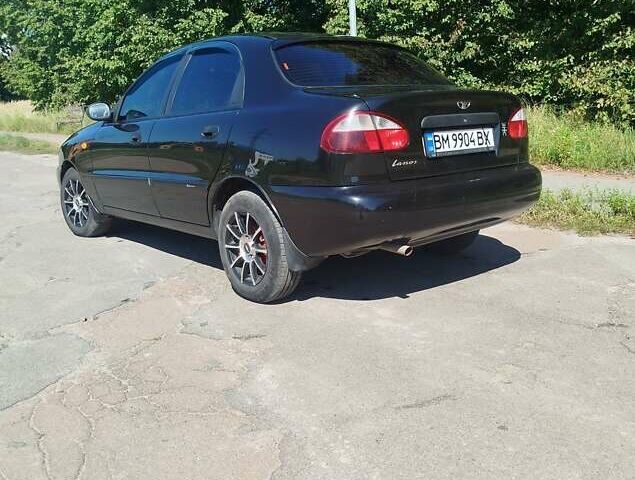 Черный Дэу Ланос, объемом двигателя 1.5 л и пробегом 157 тыс. км за 3200 $, фото 11 на Automoto.ua