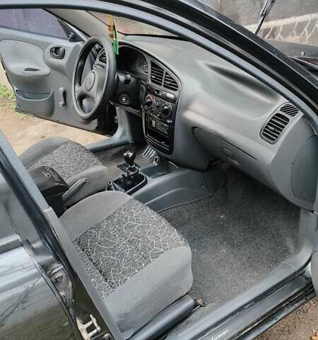 Черный Дэу Ланос, объемом двигателя 1.5 л и пробегом 130 тыс. км за 2700 $, фото 6 на Automoto.ua