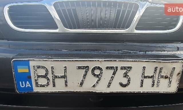 Черный Дэу Ланос, объемом двигателя 1.5 л и пробегом 240 тыс. км за 1850 $, фото 2 на Automoto.ua