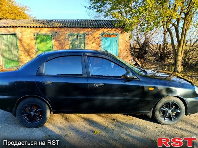 Чорний Деу Ланос, об'ємом двигуна 1.6 л та пробігом 238 тис. км за 2700 $, фото 4 на Automoto.ua