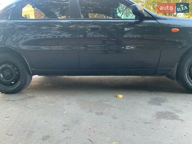 Чорний Деу Ланос, об'ємом двигуна 1.5 л та пробігом 245 тис. км за 3100 $, фото 11 на Automoto.ua