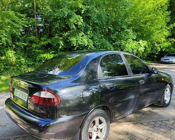 Черный Дэу Ланос, объемом двигателя 1.4 л и пробегом 165 тыс. км за 1450 $, фото 6 на Automoto.ua