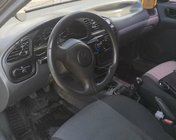 Черный Дэу Ланос, объемом двигателя 1.5 л и пробегом 153 тыс. км за 2700 $, фото 4 на Automoto.ua