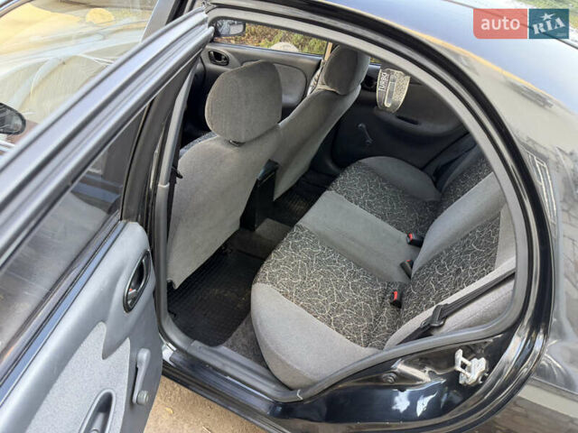 Черный Дэу Ланос, объемом двигателя 1.5 л и пробегом 100 тыс. км за 2900 $, фото 23 на Automoto.ua