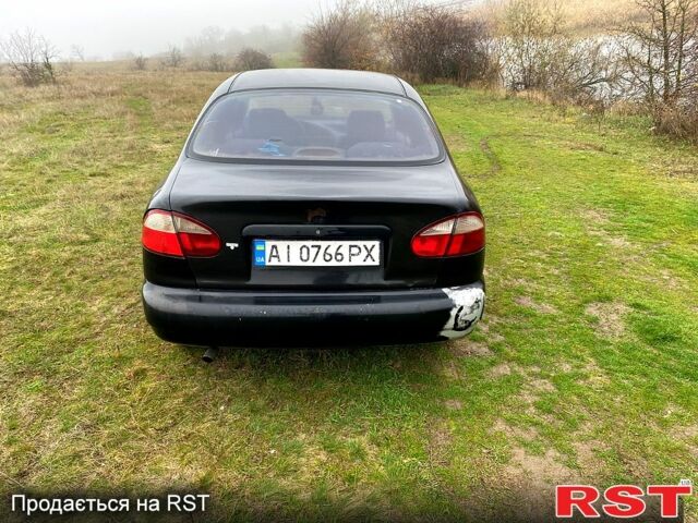 Чорний Деу Ланос, об'ємом двигуна 1.5 л та пробігом 256 тис. км за 1100 $, фото 4 на Automoto.ua