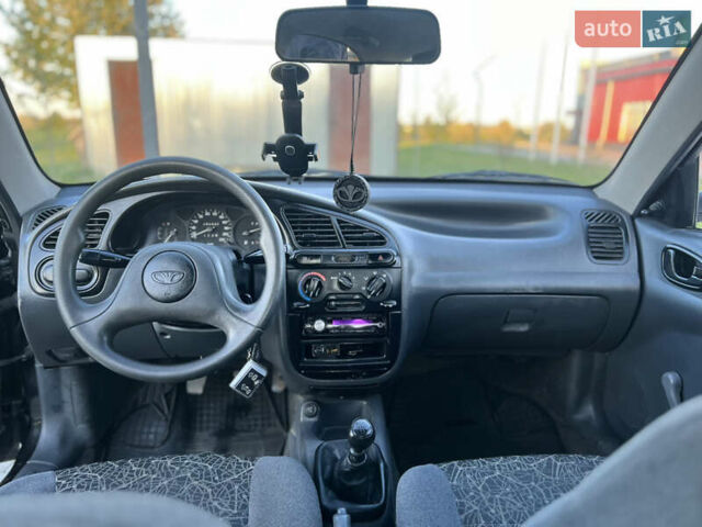 Черный Дэу Ланос, объемом двигателя 1.5 л и пробегом 162 тыс. км за 2200 $, фото 4 на Automoto.ua