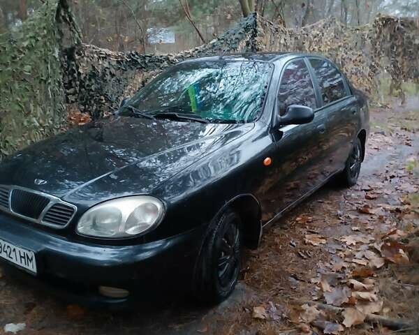 Чорний Деу Ланос, об'ємом двигуна 1.39 л та пробігом 170 тис. км за 2500 $, фото 3 на Automoto.ua