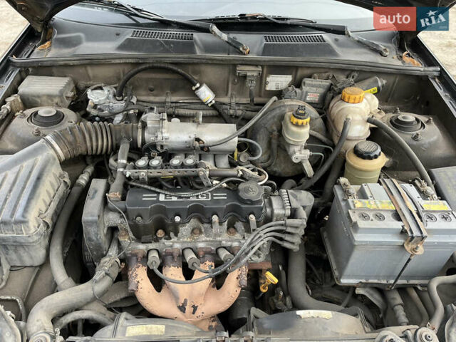Черный Дэу Ланос, объемом двигателя 1.5 л и пробегом 219 тыс. км за 2300 $, фото 15 на Automoto.ua