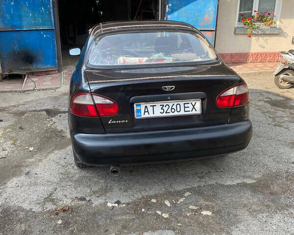 Черный Дэу Ланос, объемом двигателя 1.5 л и пробегом 226 тыс. км за 2000 $, фото 3 на Automoto.ua