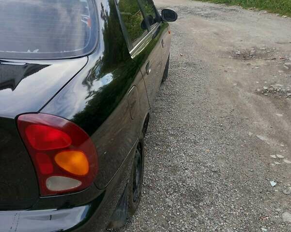 Чорний Деу Ланос, об'ємом двигуна 1.5 л та пробігом 300 тис. км за 3200 $, фото 12 на Automoto.ua