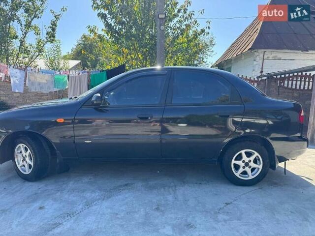 Чорний Деу Ланос, об'ємом двигуна 1.5 л та пробігом 77 тис. км за 2900 $, фото 2 на Automoto.ua
