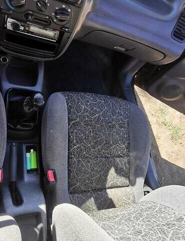 Черный Дэу Ланос, объемом двигателя 1.3 л и пробегом 160 тыс. км за 2000 $, фото 12 на Automoto.ua