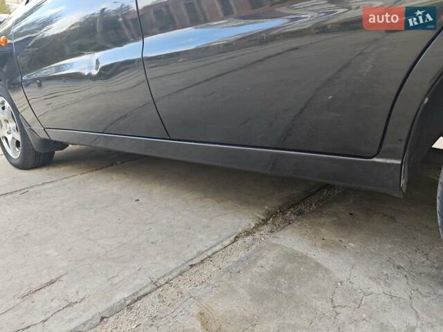 Деу Ланос 2008 у Запоріжжя на Automoto.ua Чорний Деу Ланос, об'ємом двигуна 1.5 л та пробігом 187 тис. км за 2350 $, фото 3 на Automoto.ua