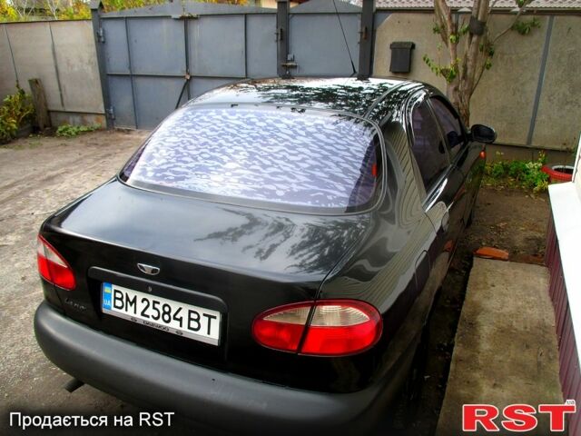 Деу Ланос 2008 у Лебедине на Automoto.ua Чорний Деу Ланос, об'ємом двигуна 1.5 л та пробігом 230 тис. км за 2000 $, фото 2 на Automoto.ua