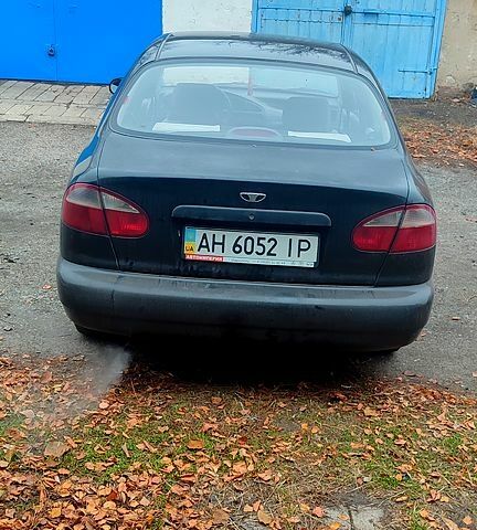 Черный Дэу Ланос, объемом двигателя 1.4 л и пробегом 222 тыс. км за 1400 $, фото 2 на Automoto.ua