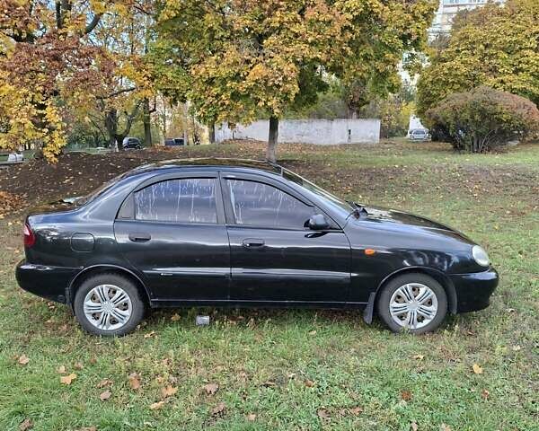 Чорний Деу Ланос, об'ємом двигуна 1.5 л та пробігом 219 тис. км за 1900 $, фото 3 на Automoto.ua