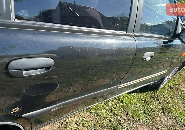 Чорний Деу Ланос, об'ємом двигуна 1.5 л та пробігом 235 тис. км за 2500 $, фото 9 на Automoto.ua