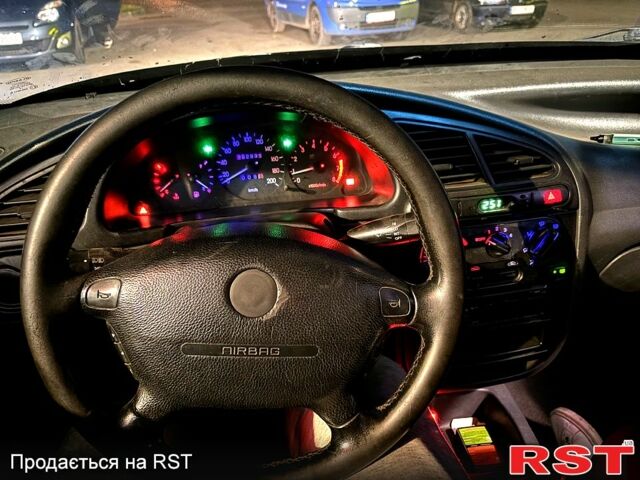 Черный Дэу Ланос, объемом двигателя 1.5 л и пробегом 292 тыс. км за 2300 $, фото 8 на Automoto.ua