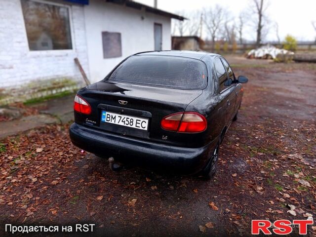 Чорний Деу Ланос, об'ємом двигуна 1.4 л та пробігом 150 тис. км за 1300 $, фото 3 на Automoto.ua