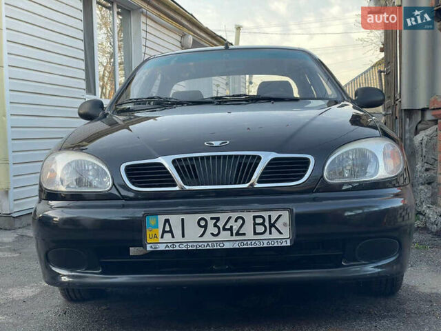 Чорний Деу Ланос, об'ємом двигуна 1.5 л та пробігом 100 тис. км за 3000 $, фото 1 на Automoto.ua