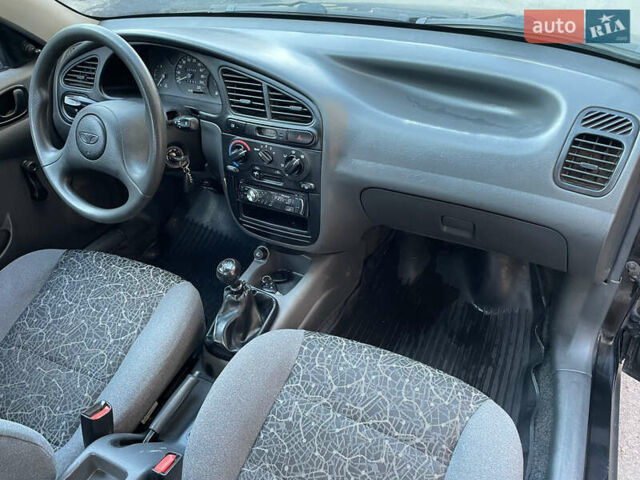 Черный Дэу Ланос, объемом двигателя 1.4 л и пробегом 233 тыс. км за 2500 $, фото 26 на Automoto.ua