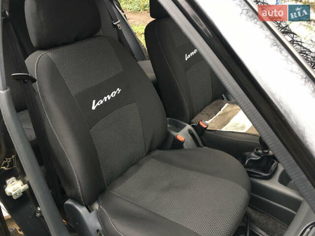 Черный Дэу Ланос, объемом двигателя 1.5 л и пробегом 165 тыс. км за 3000 $, фото 10 на Automoto.ua