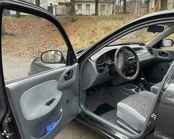 Чорний Деу Ланос, об'ємом двигуна 1.5 л та пробігом 167 тис. км за 2999 $, фото 3 на Automoto.ua