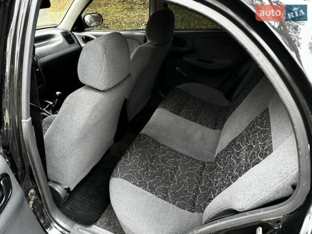 Чорний Деу Ланос, об'ємом двигуна 1.5 л та пробігом 220 тис. км за 2199 $, фото 13 на Automoto.ua