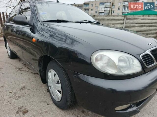 Черный Дэу Ланос, объемом двигателя 1.5 л и пробегом 240 тыс. км за 1800 $, фото 2 на Automoto.ua